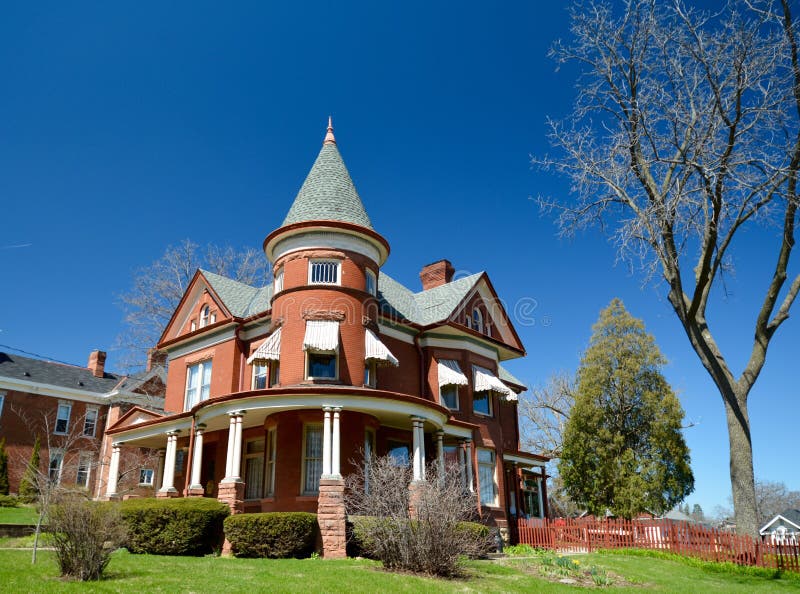 This is a Spring picture of a large house in Dubuque, Iowa. The house built in 1895 is an example of Queen Anne architecture. The house is part of the Longworthy Historic District which was added to the National Register of Historic Places on August 12, 2004. This picture was taken on April 9, 2016. This is a Spring picture of a large house in Dubuque, Iowa. The house built in 1895 is an example of Queen Anne architecture. The house is part of the Longworthy Historic District which was added to the National Register of Historic Places on August 12, 2004. This picture was taken on April 9, 2016.