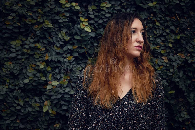 Look to nature and you will find yourself. a beautiful young woman outside. royalty free stock photo