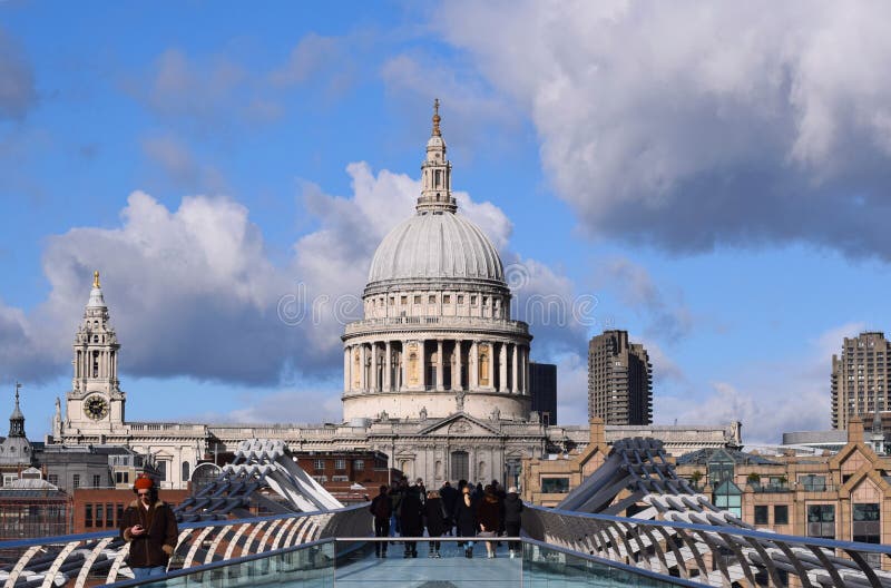 Looking across the Millennium Bridge from the Tate Modern Southbank side of the River Thames towards the beautiful dome of St Paul stock photos Looking across the Millennium Bridge from the Tate Modern Southbank side of the River Thames towards the beautiful dome of St Paul stock photos