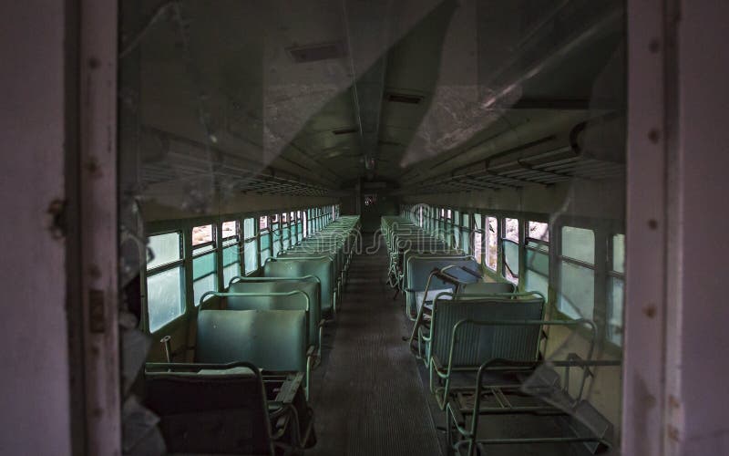 Looking through a broken glass inside an old train stock image Looking through a broken glass inside an old train stock image
