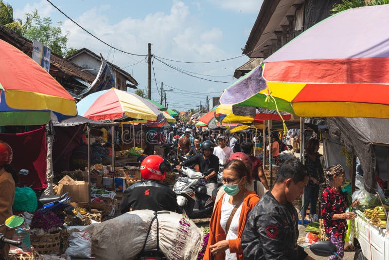 Looking down a busy way with lots of people and markets on the side of the lane July 22 2019 royalty free stock images Looking down a busy way with lots of people and markets on the side of the lane July 22 2019 royalty free stock images