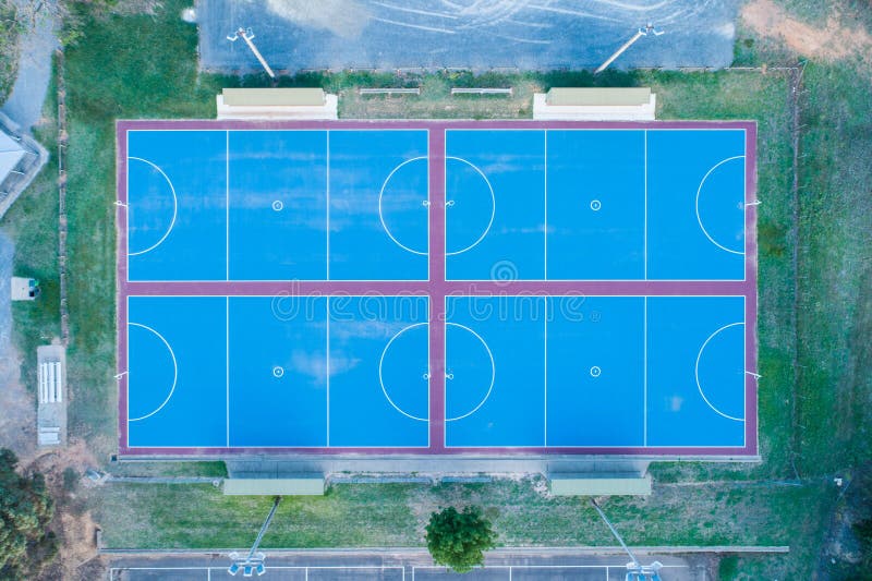 Looking down at new blue netball courts