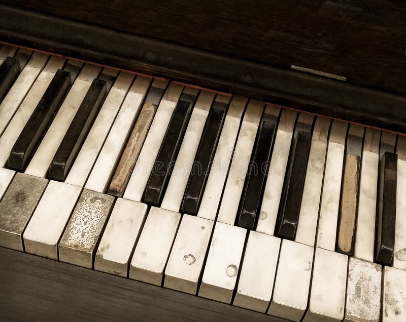 Looking down overhead view of old abandoned antique distressed piano keyboard close up stock photos Looking down overhead view of old abandoned antique distressed piano keyboard close up stock photos