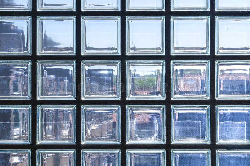Wall made of glass blocks stock image. Image of material 260195091