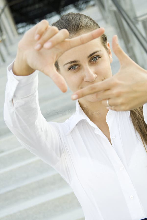 Looking through frame - sight businesswoman