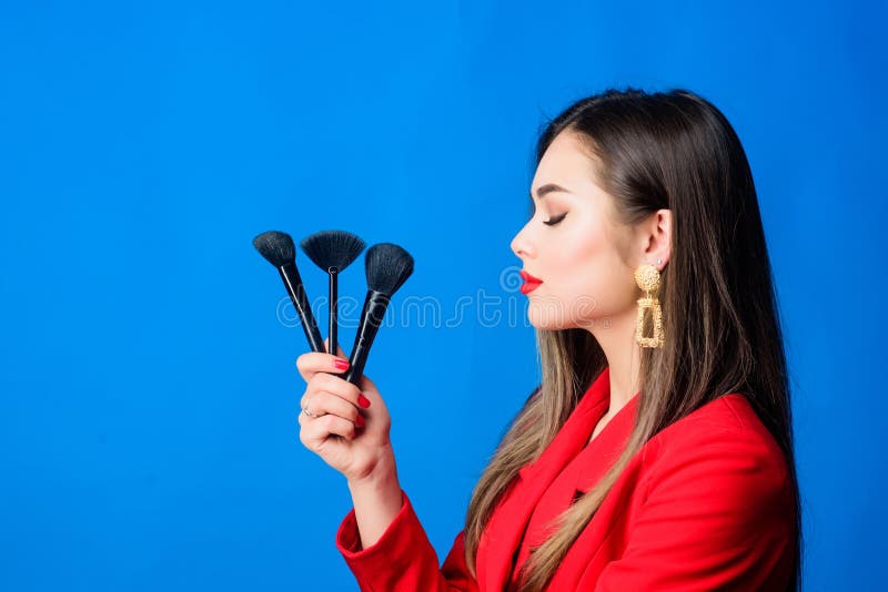 Looking good and feeling confident. Professional makeup supplies shop. Makeup courses. Gorgeous lady make up red lips stock photography Looking good and feeling confident. Professional makeup supplies shop. Makeup courses. Gorgeous lady make up red lips stock photography