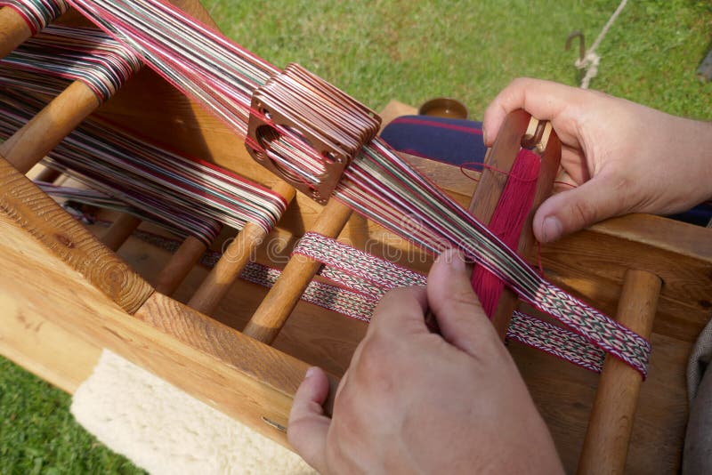 Loom with Weaving Shuttle for Making Borders and Edgings. Stock Photo