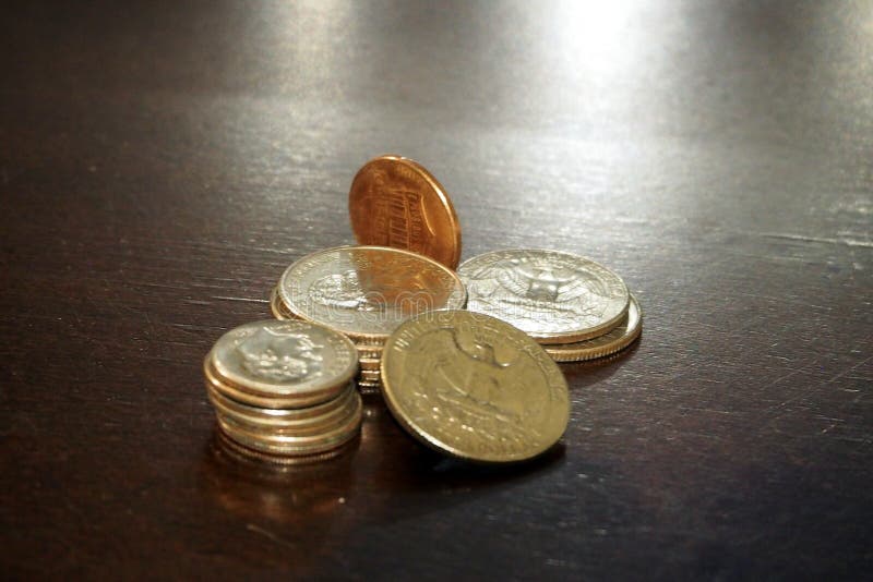 Loose coins on a surface stock image. Image of coin 192475635