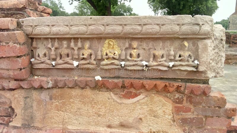 Lord Buddha on stone stock image