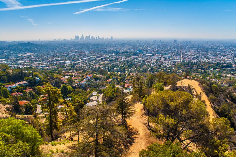 View of Los Angeles aglomeration (suburs and Downtown) from Griffith Observatory during hot summer day.