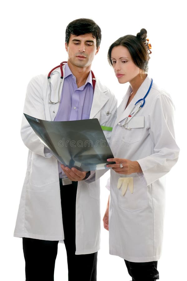Los doctores discuten la radiografía paciente imagen de archivo Los doctores discuten la radiografía paciente imagen de archivo