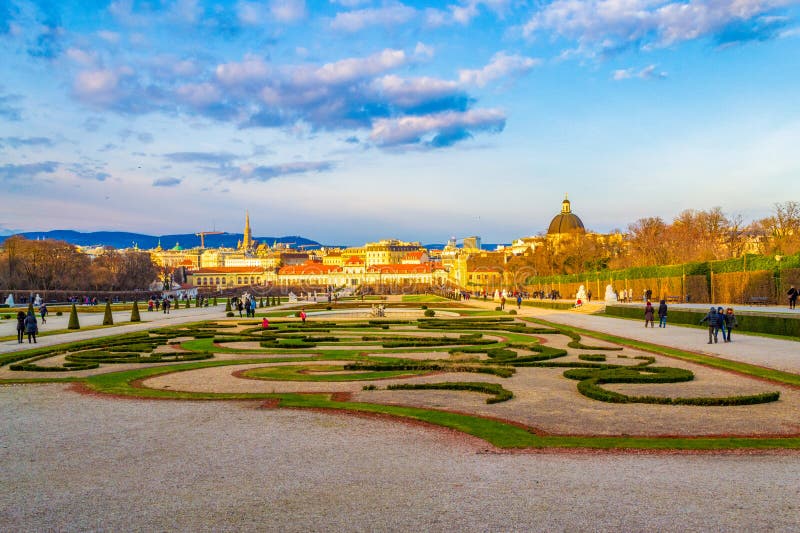 Belvedere Palace gardens and Vienna cityscape at winter .The Belvedere is a historic building complex in Vienna, Austria, consisting of two Baroque palaces (the Upper and Lower Belvedere), the Orangery, and the Palace Stables. The Belvedere Gardens were designed in the formal French manner with clipped hedges, gravelled walks.December 21th 2014. Belvedere Palace gardens and Vienna cityscape at winter .The Belvedere is a historic building complex in Vienna, Austria, consisting of two Baroque palaces (the Upper and Lower Belvedere), the Orangery, and the Palace Stables. The Belvedere Gardens were designed in the formal French manner with clipped hedges, gravelled walks.December 21th 2014