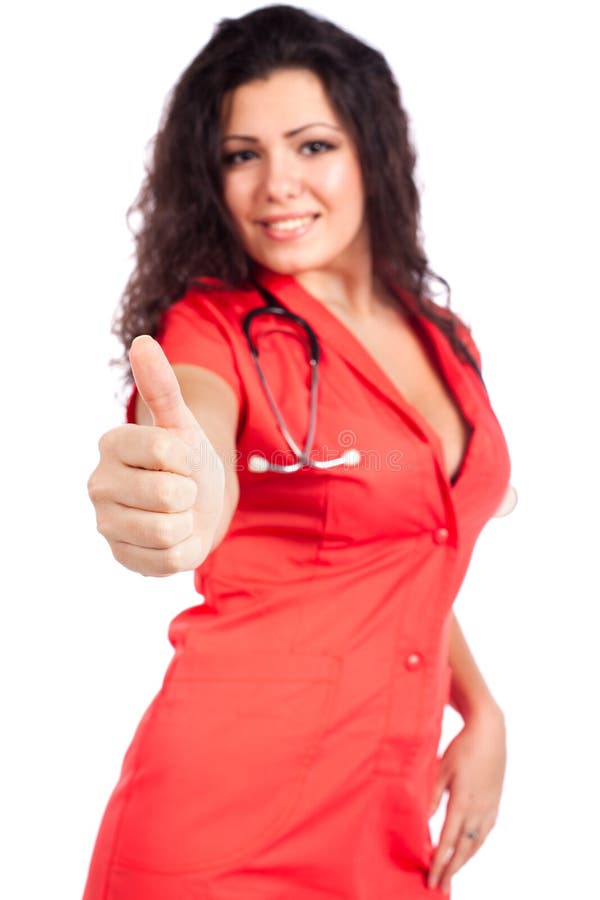 Los jóvenes cuidan o el doctor de la mujer con el pulgar para arriba imágenes de archivo libres de regalías Los jóvenes cuidan o el doctor de la mujer con el pulgar para arriba imágenes de archivo libres de regalías
