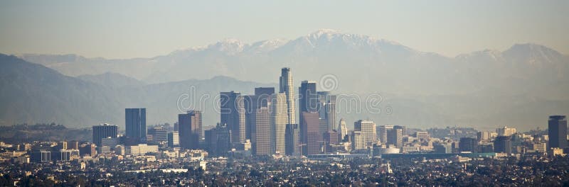 Los Angeles skyline with mountains behind. Los Angeles skyline with mountains behind