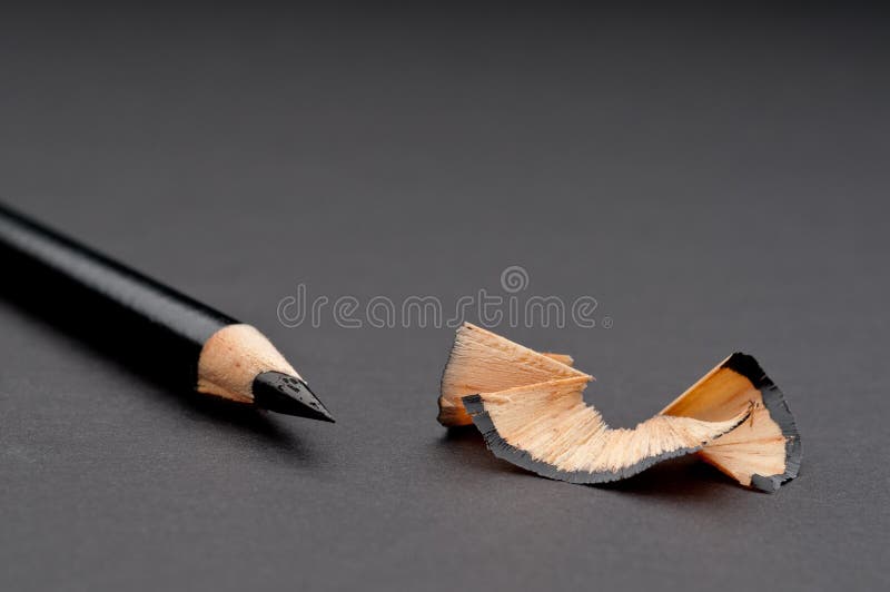 Lose up of a sharpened black pencil