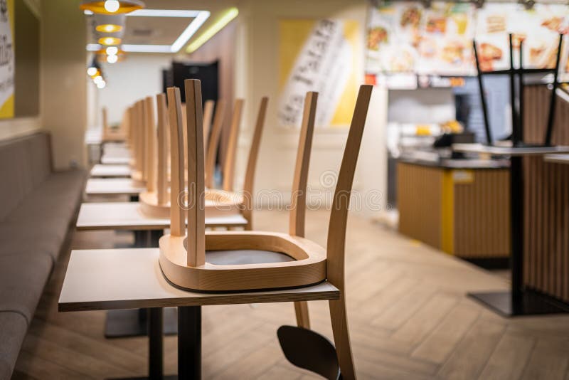 Closed Restaurant with Chairs on Tables because of Lockdown or Shutdown