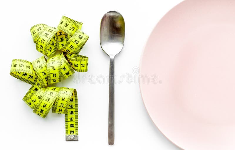 Download Losing Weight. Strict Diet. Empty Plate And Measuring Tape On White Background Top View Mockup ...
