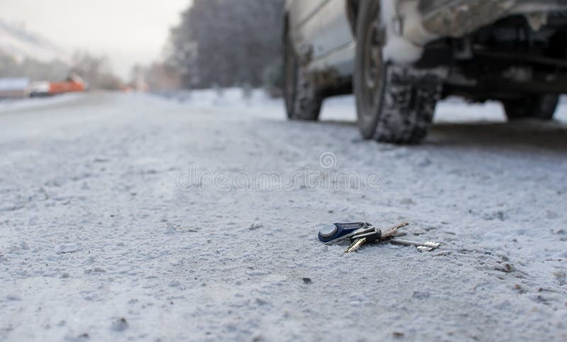 Lost a bunch of keys lying on the side of the road in the winter on the snow royalty free stock photography