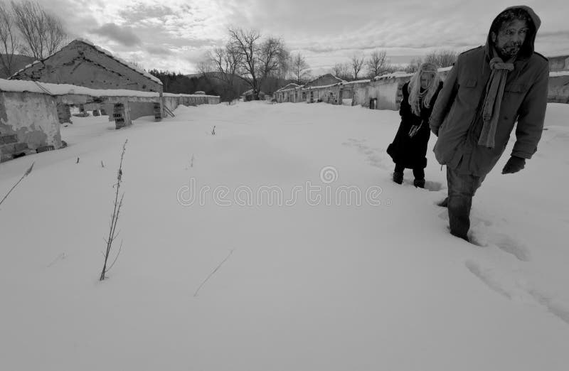 Lost couple walking ruins stock photography