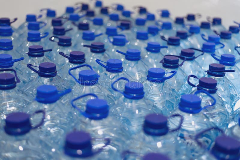 Lot of Bottles Worth with Clean Cool Natural Water. Group of Plastic