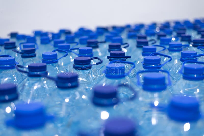 Lot of Bottles Worth with Clean Cool Natural Water. Group of Plastic