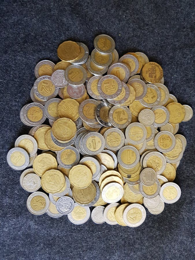 lot of coins of mexican pesos in various denominations royalty free stock images lot of coins of mexican pesos in various denominations royalty free stock images