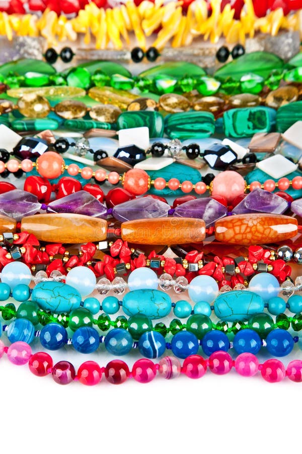 Lot Of Colored Beads From Different Minerals. Stone Background Stock