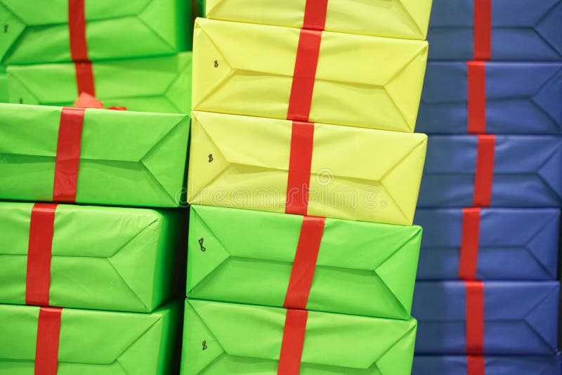 A Lot of Colorful Cardboard Boxes without Labels are Large Stacks Stock