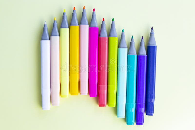 A Lot of Colorful Felt-tip Pens for Drawing in a Notebook and Album on a  Yellow Background Stock Image - Image of palette, education: 252582799