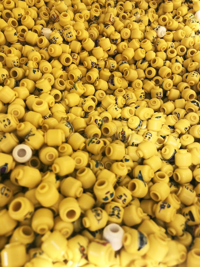 A lot of Mini figures Lego with different prints and designs, different facial expressions. royalty free stock photo