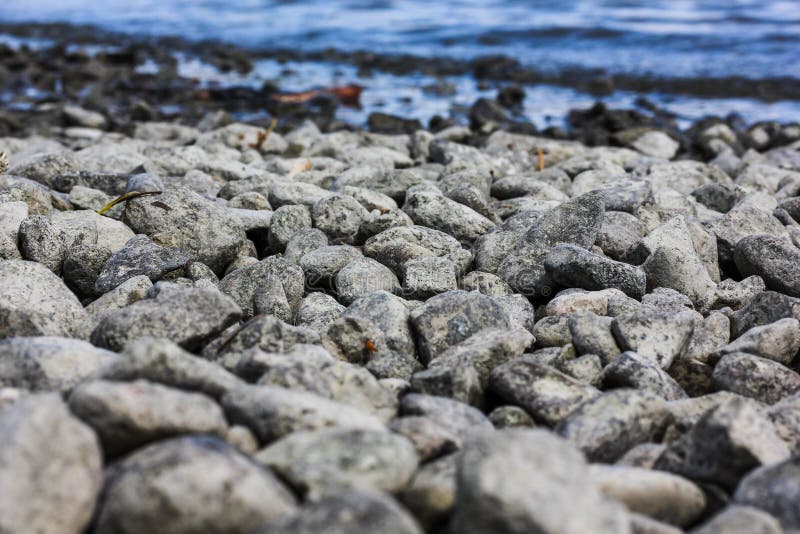 Lot of rocks on the beach near the sea - great for a cool wallpaper