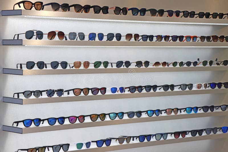 Lot of Sunglasses on the Wall Showcase Stock Photo Image of closeup
