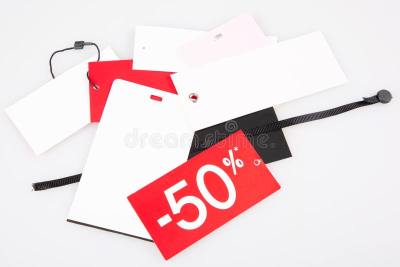 Lot of tags labels sale 50% price for shop retal clothes stock photos Lot of tags labels sale 50% price for shop retal clothes stock photos