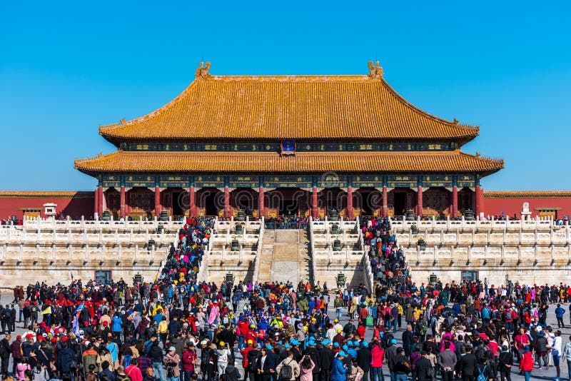 A lot of tourists entering the Taihe Palace, Hall of Supreme Harmony of the Forbidden City, the main buildings of the royal palace