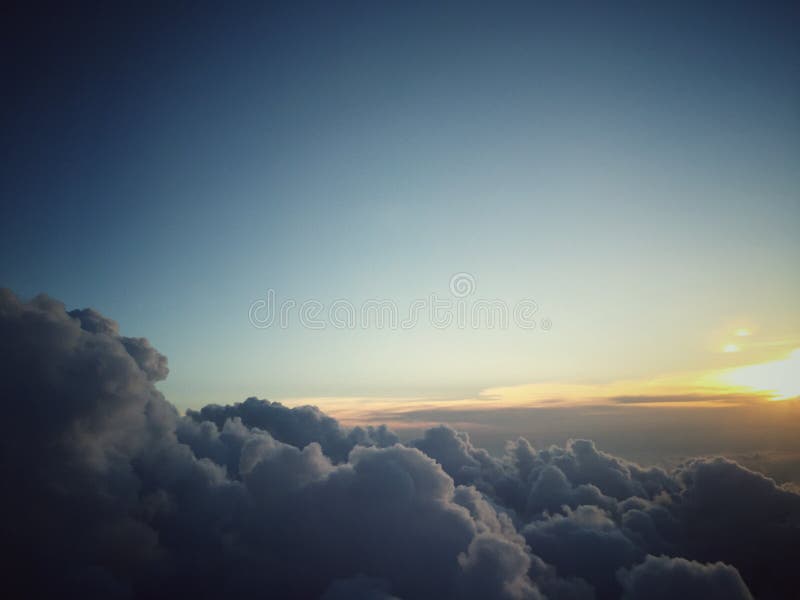 View outside airplane window as approaching the Atlanta airport in the evening sunset. View outside airplane window as approaching the Atlanta airport in the evening sunset