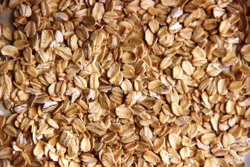 Lotes da farinha de aveia sem glúten conceito de sem glúten flocos da farinha de aveia ou da aveia como o fundo imagens de stock royalty free Lotes da farinha de aveia sem glúten conceito de sem glúten flocos da farinha de aveia ou da aveia como o fundo imagens de stock royalty free