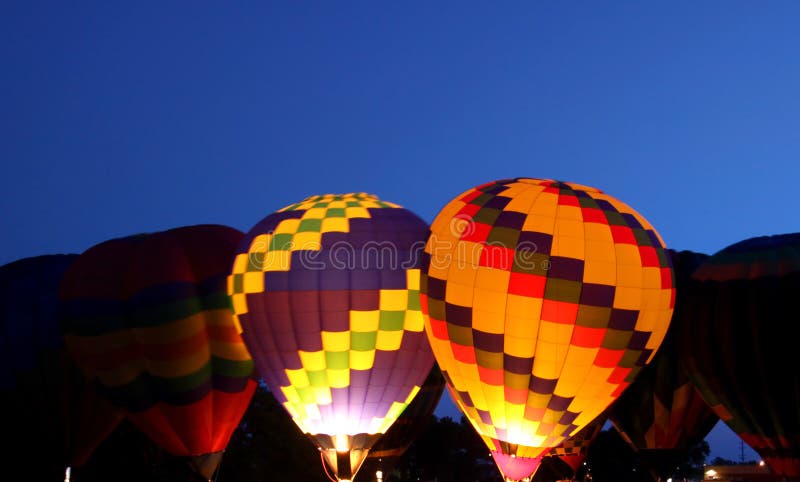 Hot air balloon glow in the dusk. Hot air balloon glow in the dusk