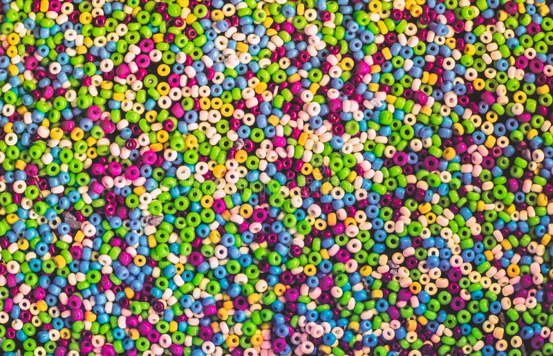 Lots of colorful fusible plastic beads used for arts and craft. stock photography Lots of colorful fusible plastic beads used for arts and craft. stock photography