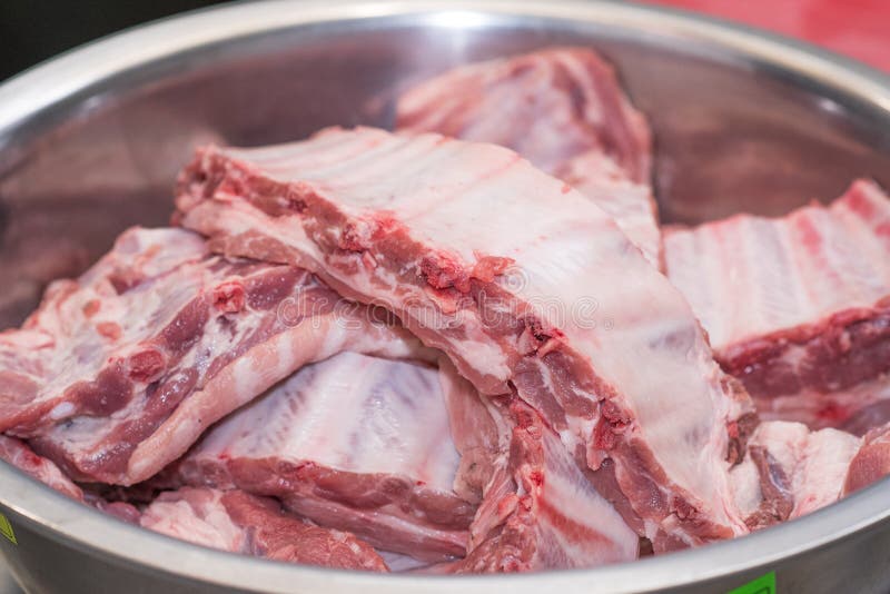 Lots of Fresh Pork Ribs in a Large Iron Bowl. Stock Image Image of