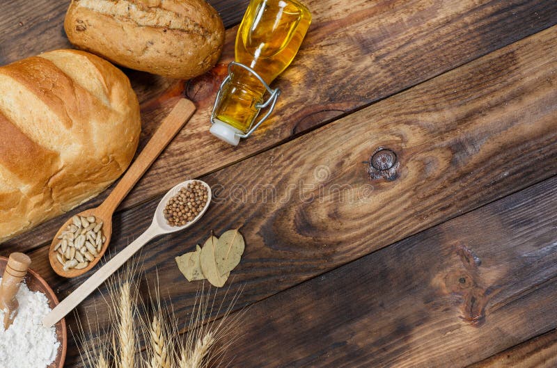 Lots of Loaves of Fresh Bread and Different Ingredients. Bread and