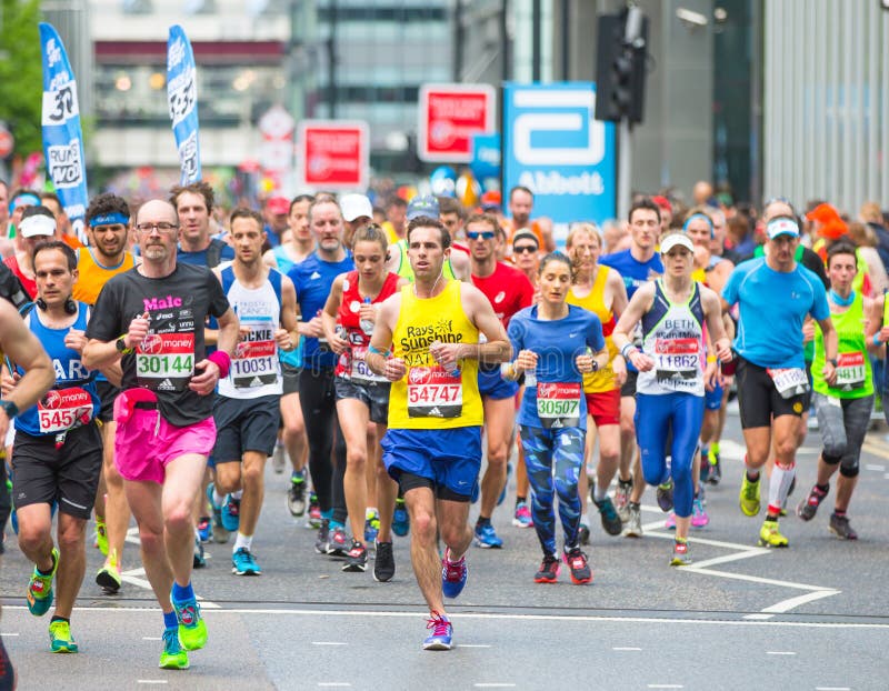 Lots of People Running in London Marathon. People Cheering the ...