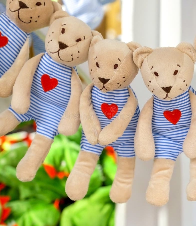 Lots of Plush Toys. Soft Bear Figures. in Striped Clothes Stock Image ...