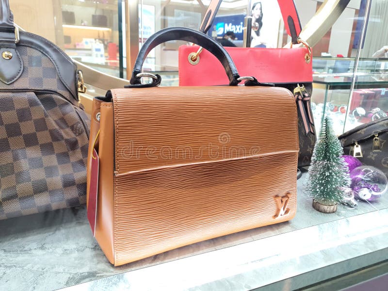 Louis Vuitton Bag In A Shop Window In Via Montenapoleone Stock Photo -  Download Image Now - iStock