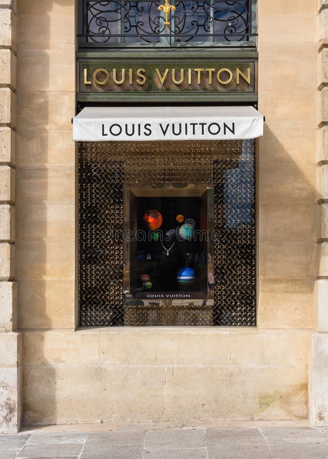 Shopping At Louis Vuitton In Paris Stock Photo - Download Image