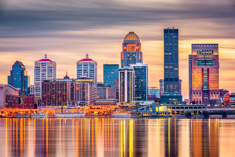 Louisville, Kentucky, USA downtown skyline on the Ohio River at dusk. Louisville, Kentucky, USA downtown skyline on the Ohio River at dusk.