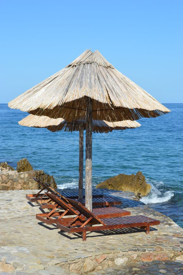 Lounge Chair on the beach stock photo. Image of outdoors 43631136