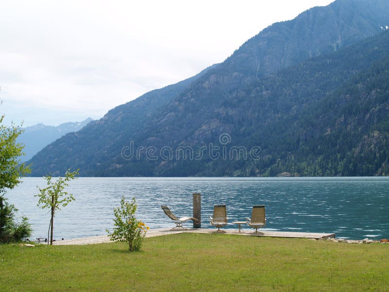 Lounge Chairs at a Mountain Lake