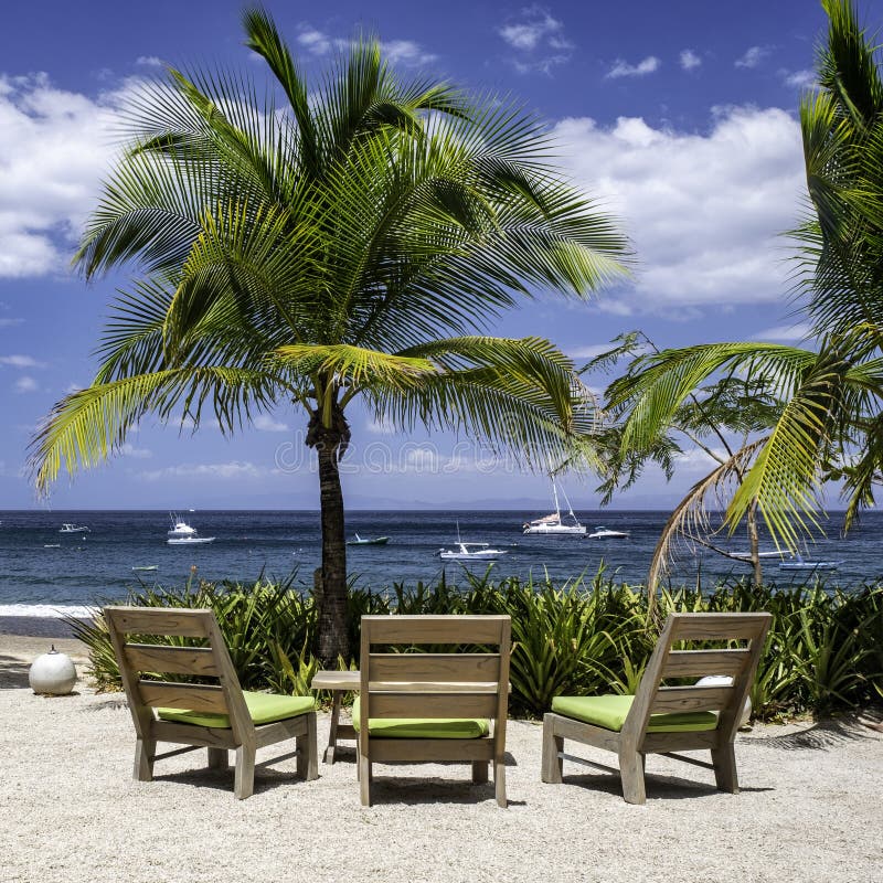 Three chairs at the ocean stock image. Image of nature 