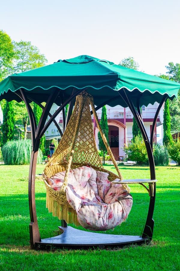 Lounge Hanging Chair with White Pillow in the Garden with Green Nature  Background Stock Image - Image of peace, leisure: 160390741