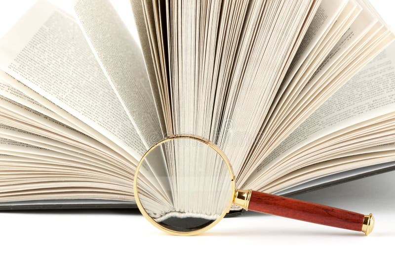 Loupe et livre image stock Loupe et livre image stock